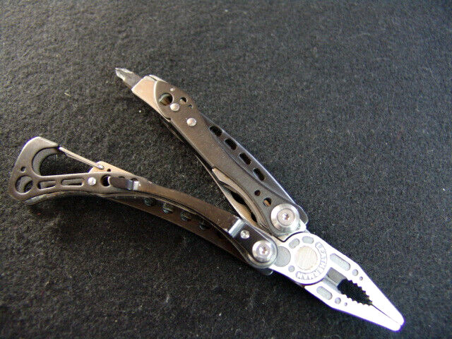 LEATHERMAN SKELETOOL CX-CARBON FIBER TRIM-EXCELLENT CONDITION-NEAR MINT