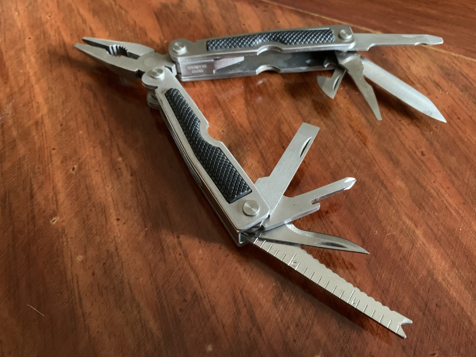 9-in-1 Stainless Steel Multi-Tool Pliers with Knife Screwdrivers Ruler