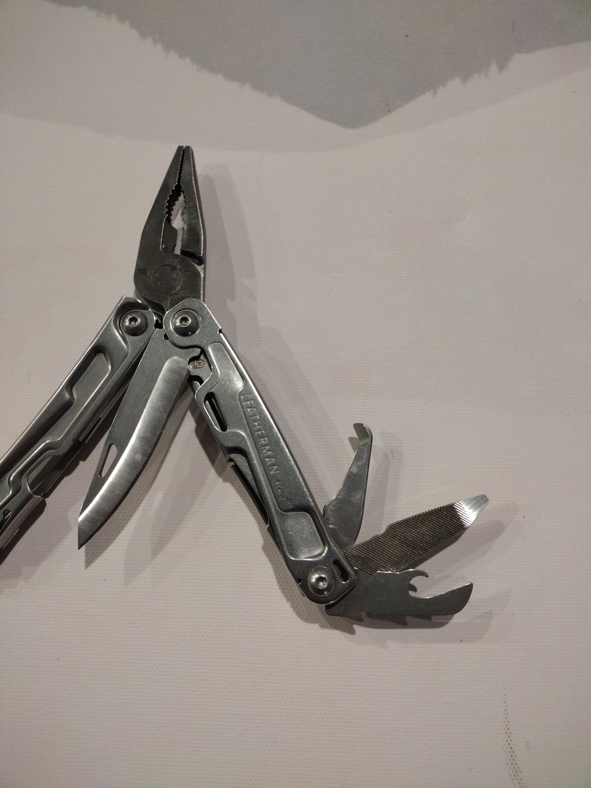 Leatherman REV 14 Tools Multi-Tool – Stainless Steel with Nylon Sheath Excellent