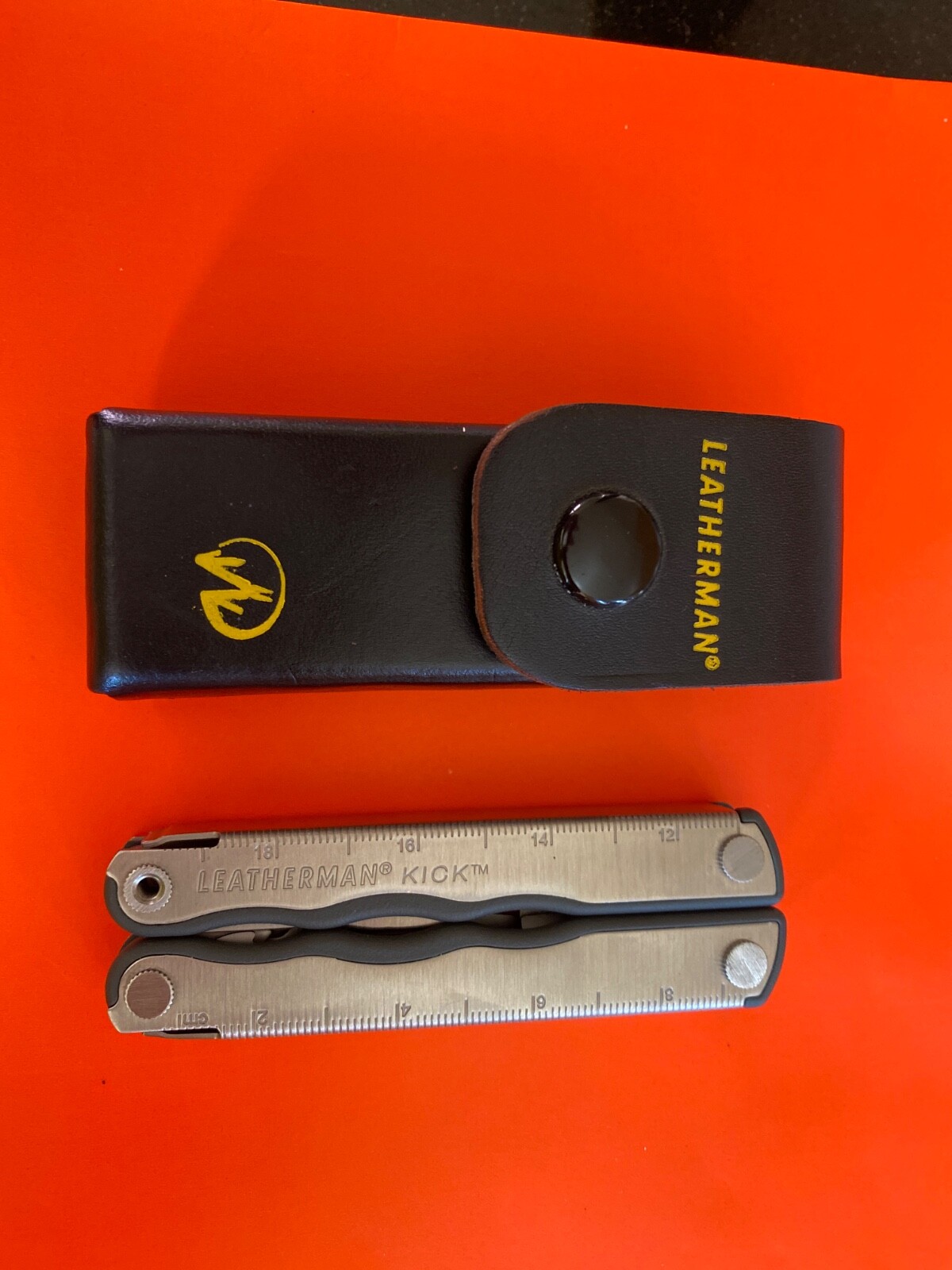 Leatherman KICK multitool. New, with vintage Leather Snap belt sheath