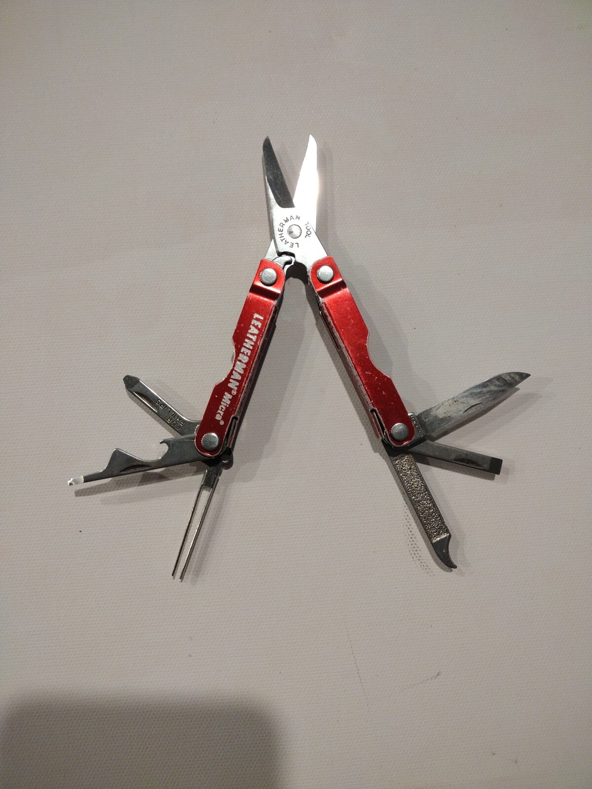 Leatherman Micra Multi-Tool, Knife, Scissors, Key Ring, Red Color in Good Condit