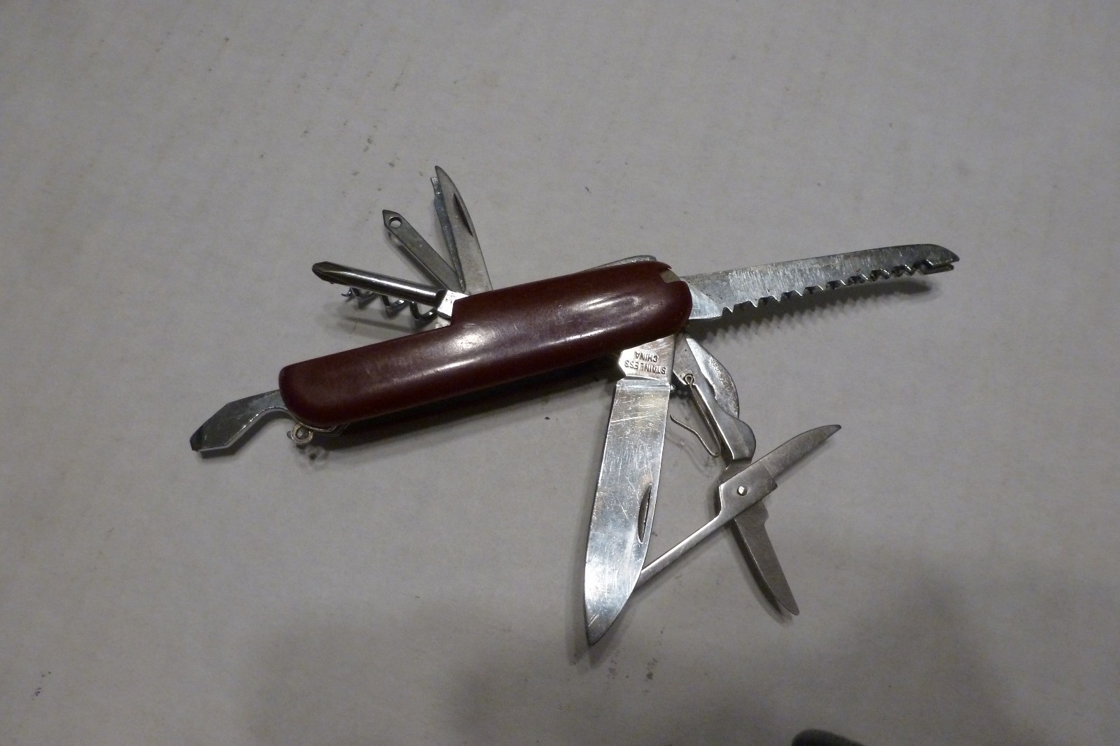 Multi Tool Knife With Scissors Screwdriver Openers Blades Corkscrew Tight