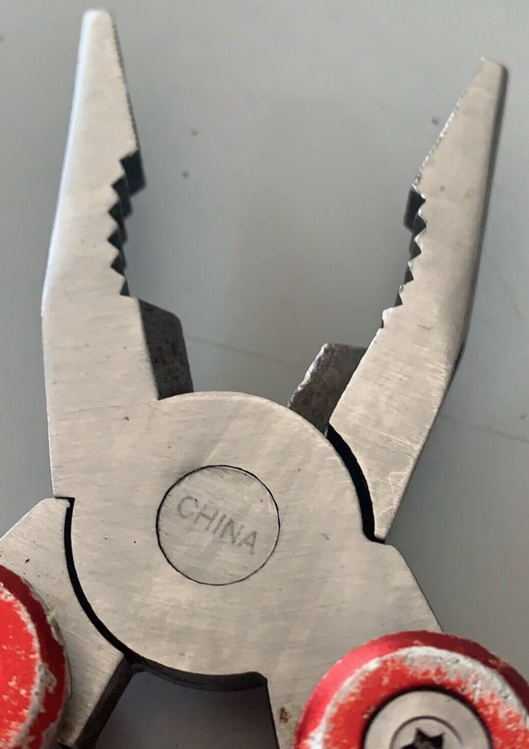 Snap-On Stainless Steel Red Easy Grip Folding Handles 9-in-1 Multi-Tool pliers
