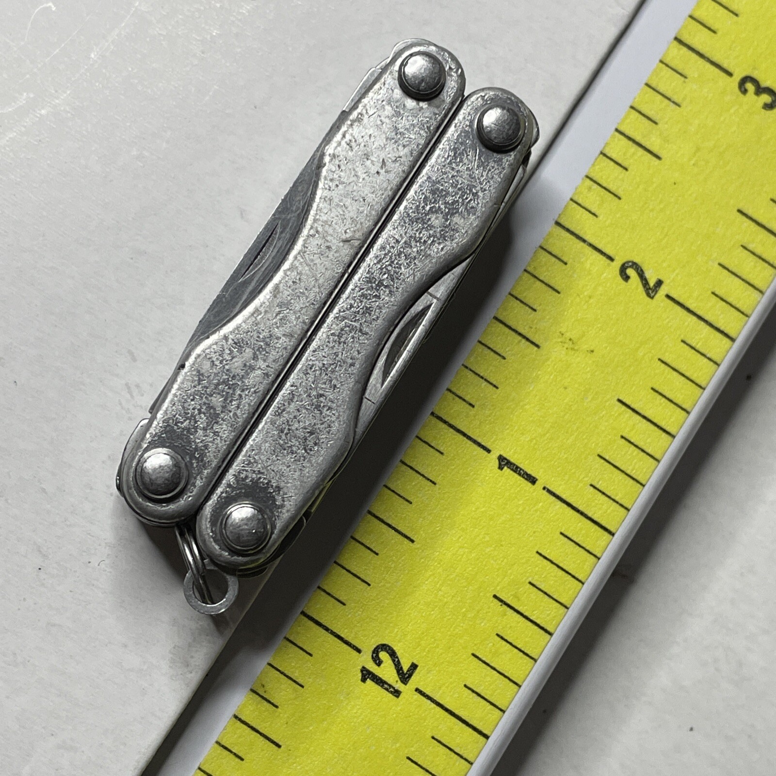 Leatherman Squirt S4 Stainless Steel Multitool Keychain – Parts or repair