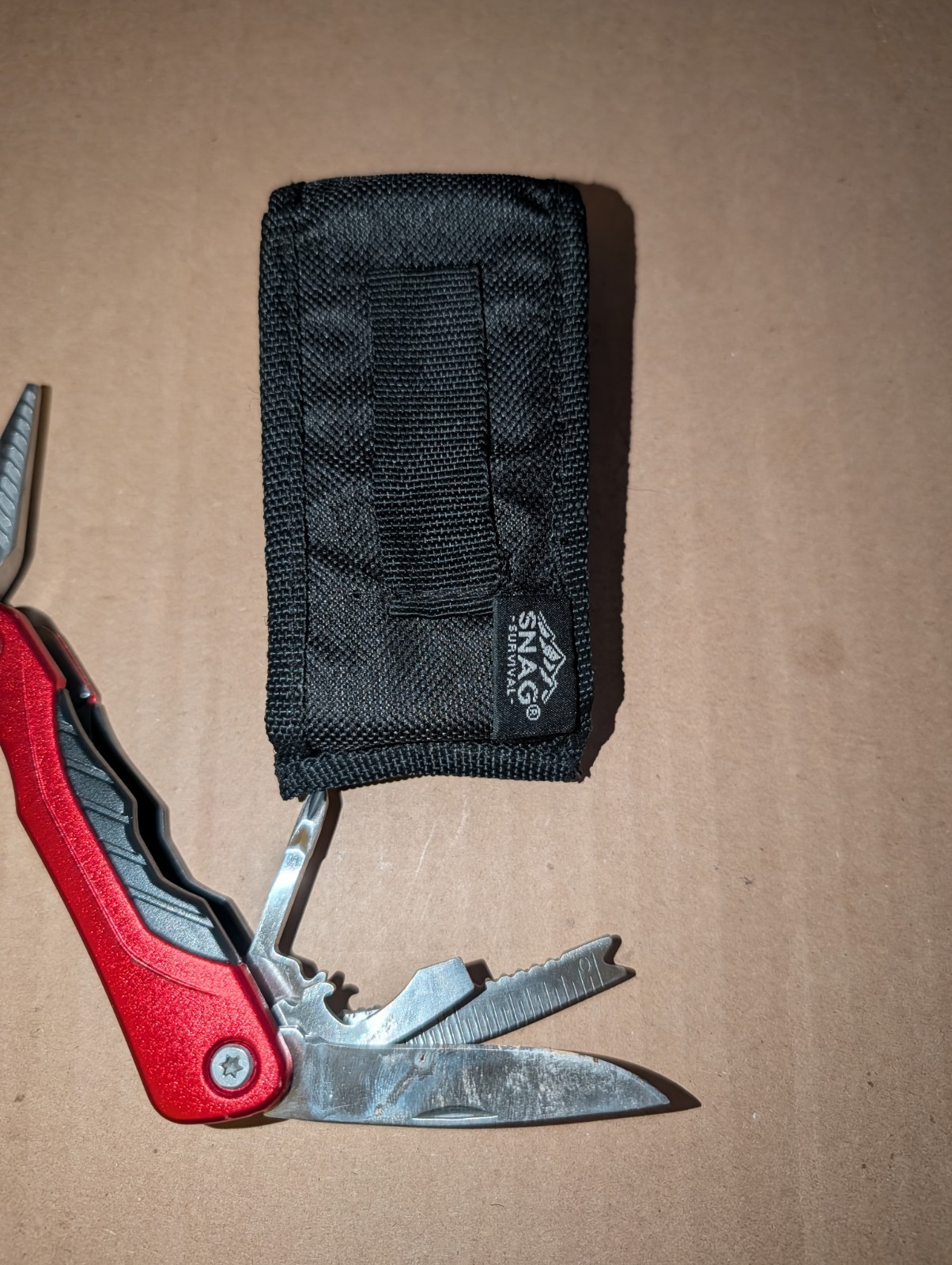 Snag Multi Purpose Tool. 10 Tools W/ Sheath