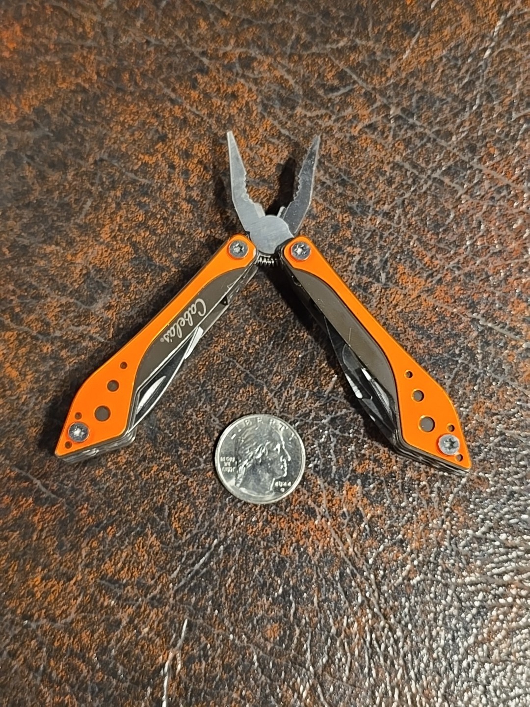 Cabela’s Multi-Tool 7 Tools in 1 Stainless Steel Neon Orange Knife Blade, Pliers