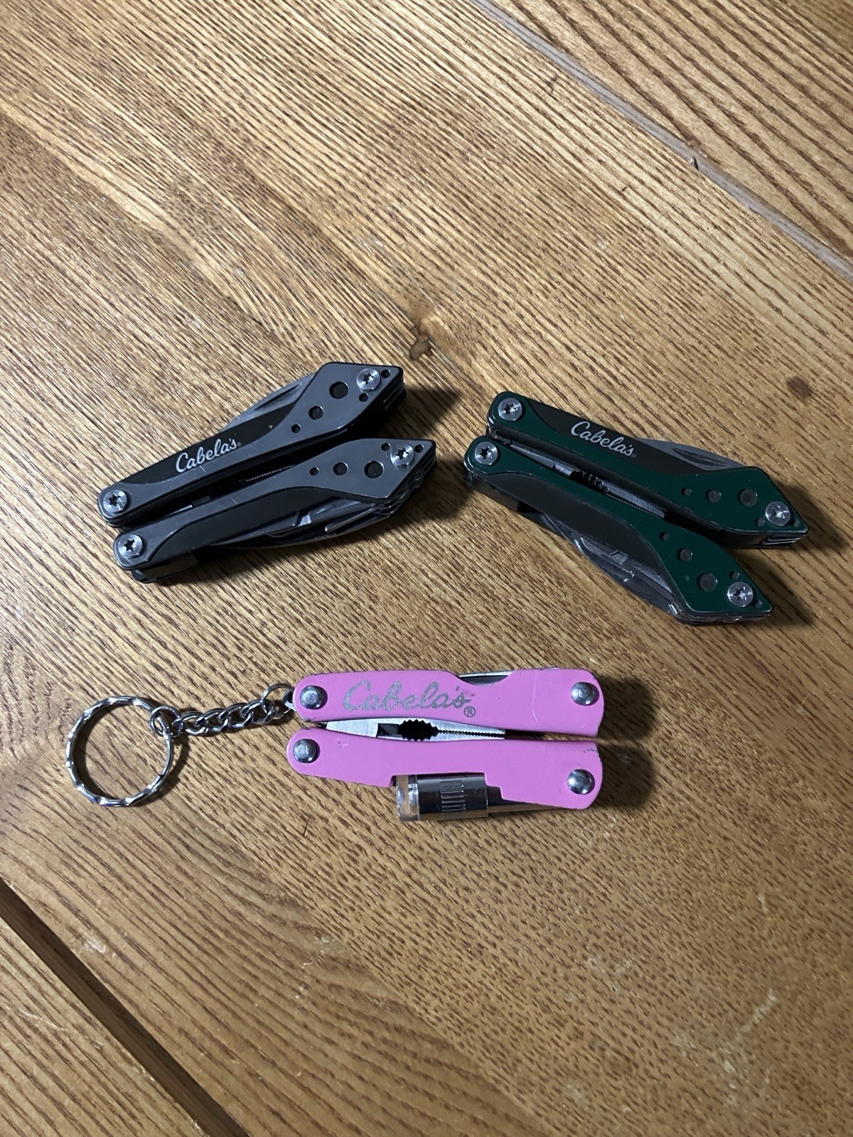 Lot Of 3 Cabela’s Green, Silver And Pink Mini Multi-Tools Spring Asst