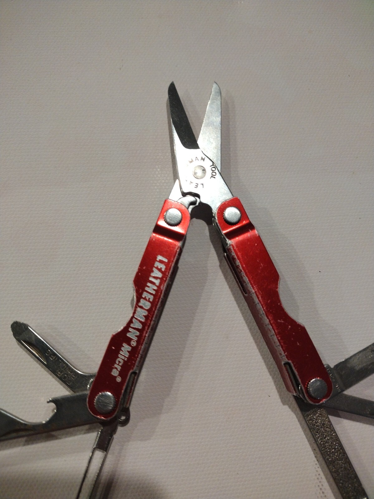 Leatherman Micra Multi-Tool, Knife, Scissors, Key Ring, Red Color in Good Condit