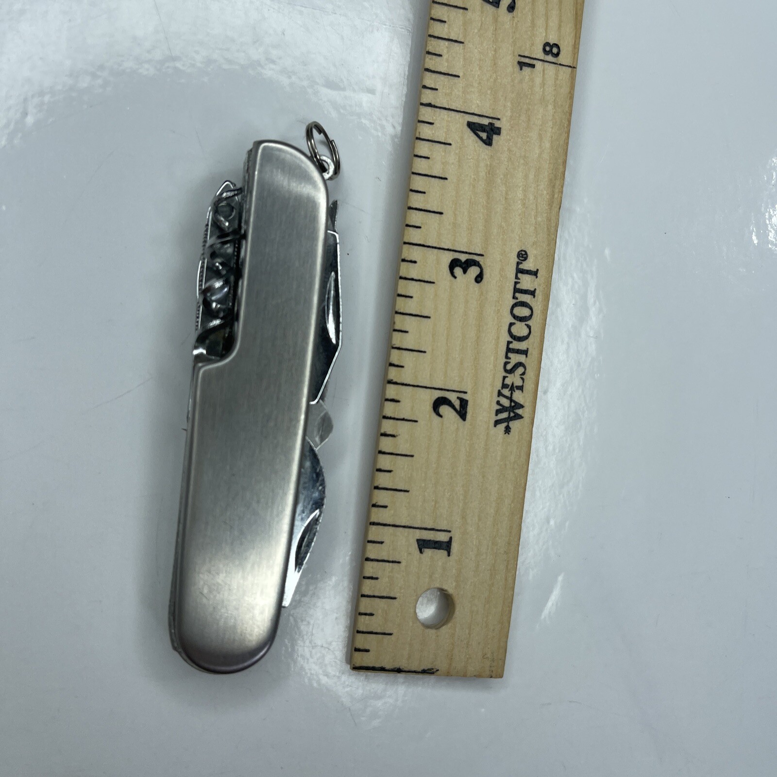 A Silver Tone Folding Utility Pocket Army Knife Stainless Scissors Cork Opener