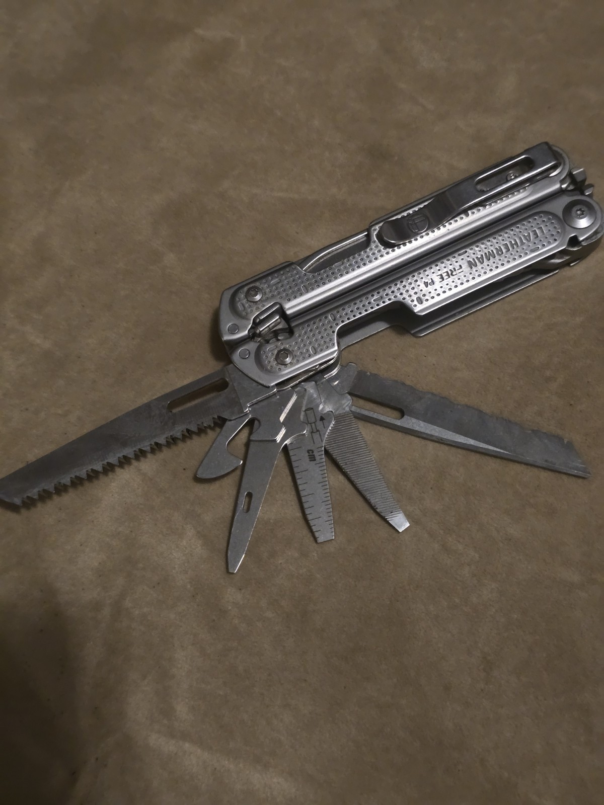Retired Leatherman Free P4 Multi-Tool With Sheath and Donk Titanium Pocket Clip