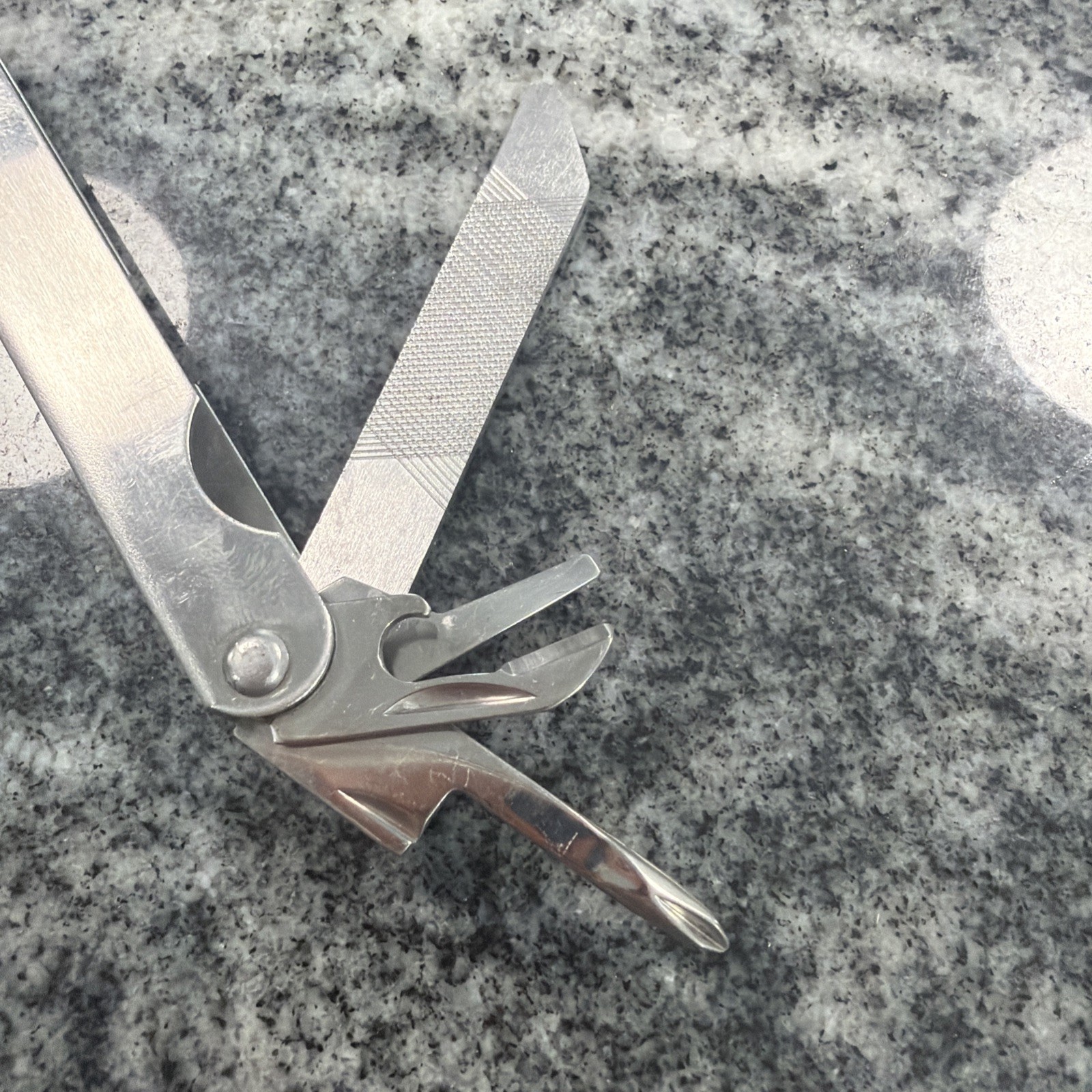 9 Tool Stainless Steel Multi Tool. Made In The Same Fashion As Original Leather