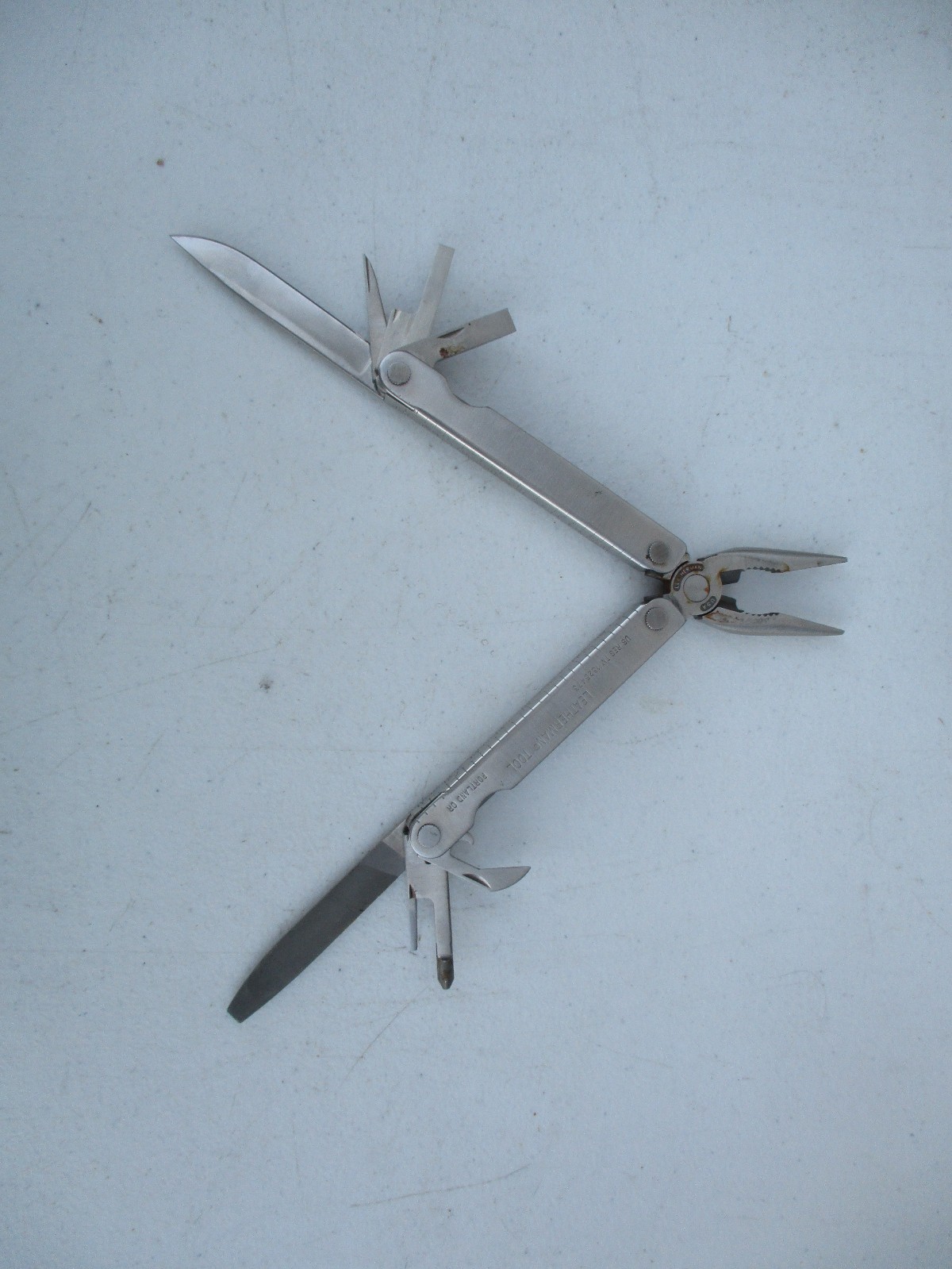 Leatherman Pocket Survival Tool USA Patent 1325473 w/ Leather Sheath Date 11/95